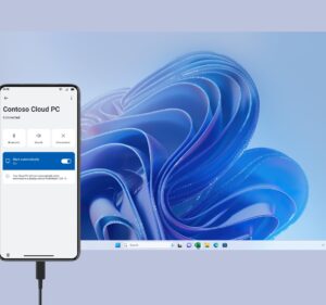 Un teléfono móvil frente a un fondo de Windows 11